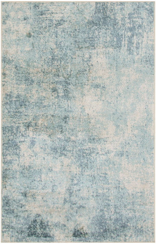 Modern abstract area rug in muted blue & cream with distressed, washed textures.