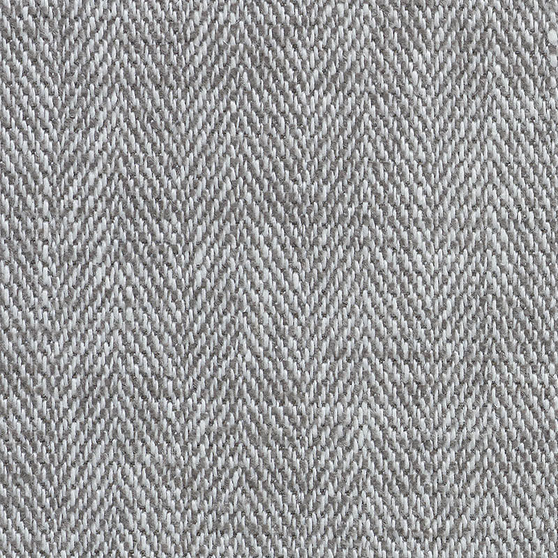 Gray herringbone twill fabric close-up, woven with white and gray threads for a classic textured textile.