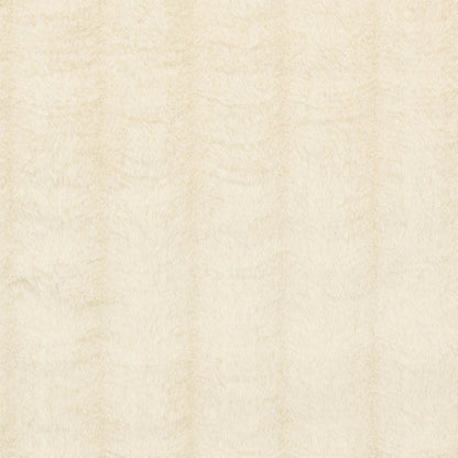 Cream textured fabric or parchment-like beige surface with subtle vertical grain.
