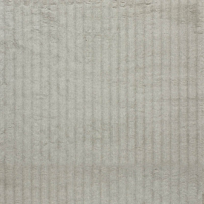Light gray ribbed textured surface with vertical grooves, corduroy-like appearance.