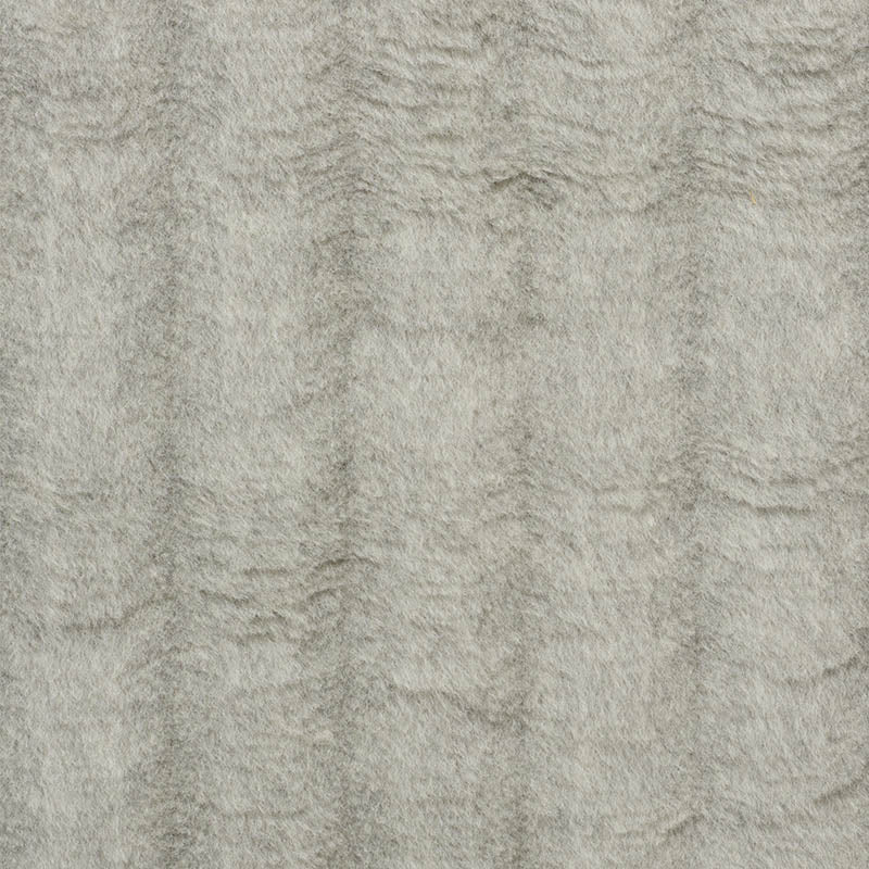 Beige-gray textured rug with plush low-pile and subtle wavy pattern.