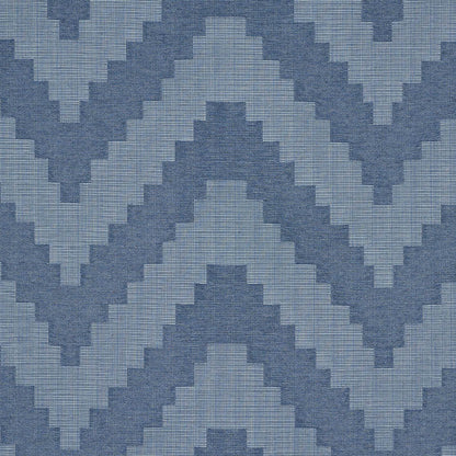 Blue chevron-diamond woven pattern fabric in light and dark blues; geometric textile for upholstery or wallpaper.