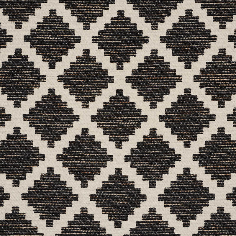 Geometric black diamond lattice on cream backdrop; woven textile texture, suitable for rug or upholstery.