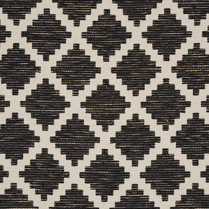 Geometric black diamond lattice on cream backdrop; woven textile texture, suitable for rug or upholstery.