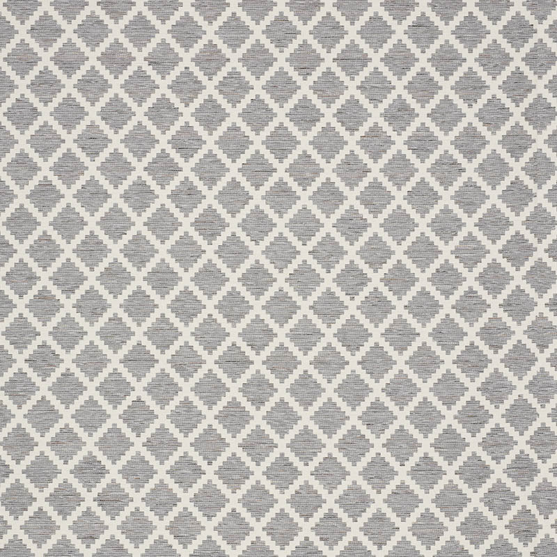 Grey & white diamond lattice rug with a textured woven surface & neutral modern geometric pattern.