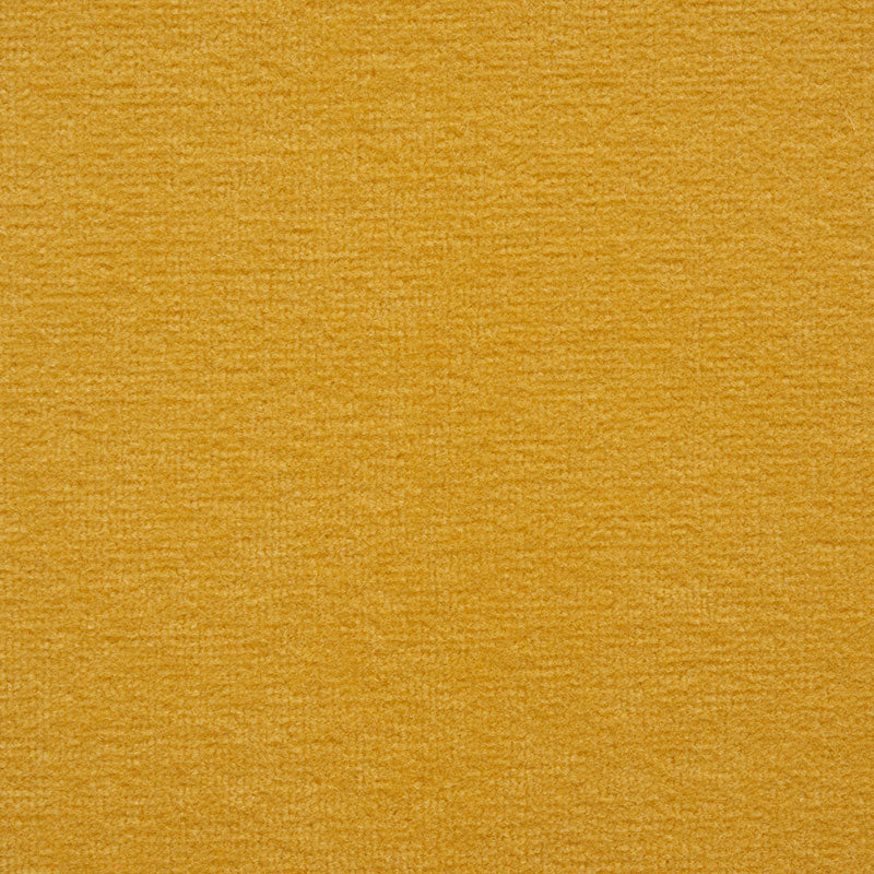 Mustard yellow velvet close-up with a soft plush nap, suitable for upholstery or crafts.