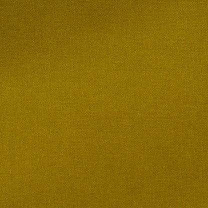 Mustard yellow velvet fabric close-up swatch with soft nap and luxurious texture.
