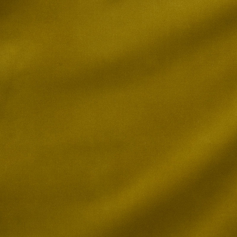 Mustard yellow fabric texture with subtle diagonal shading, a warm backdrop for product photography.