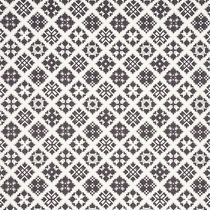 Monochrome black and white geometric tile pattern with repeating diamond motifs in a grid.