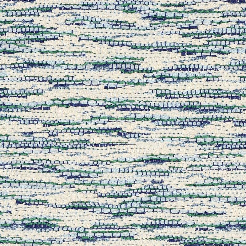 Close-up of cream boucle tweed fabric with blue & green specks and a textured horizontal stripe pattern.