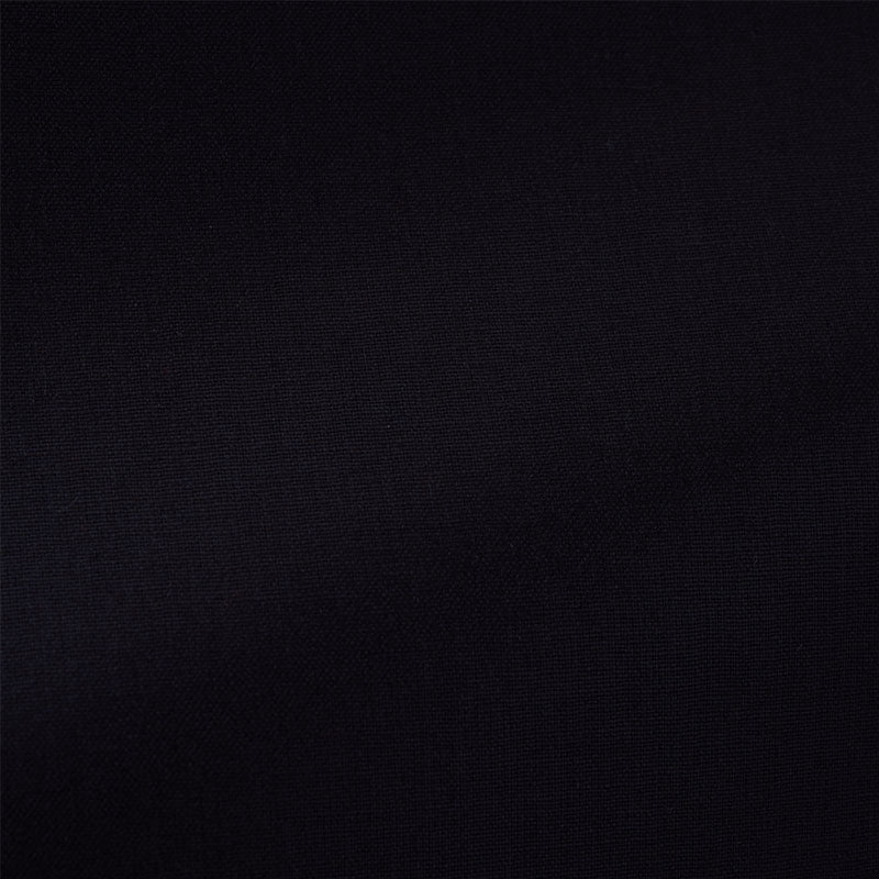 Close-up of dark black cotton chintz plains fabric with a plain weave.