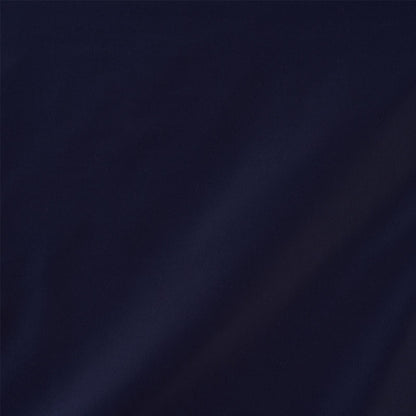 Dark navy blue fabric with subtle diagonal folds; smooth textile for apparel or home decor.