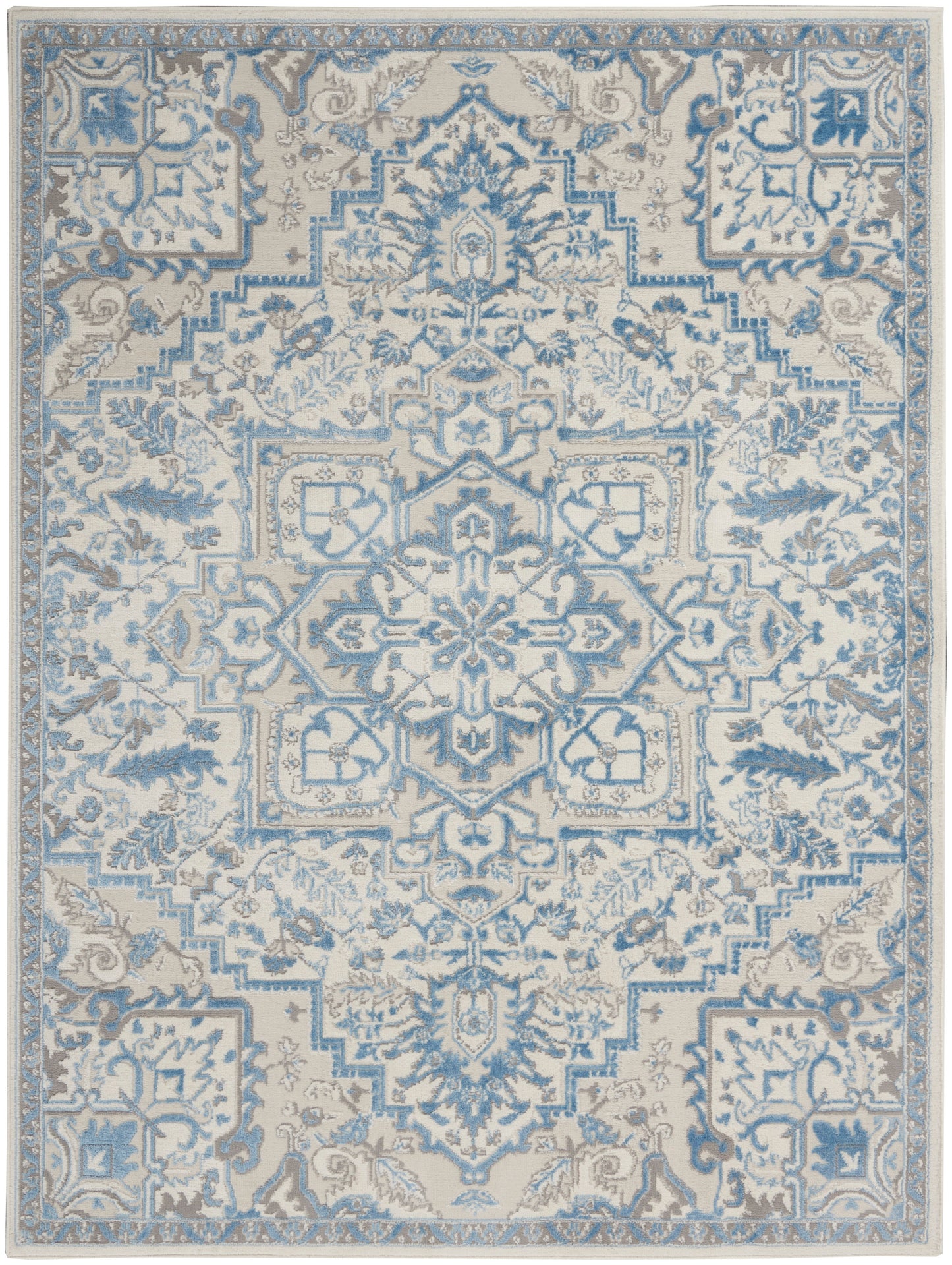 Blue & cream ornate area rug with central medallion and intricate floral border; traditional Persian-inspired design.