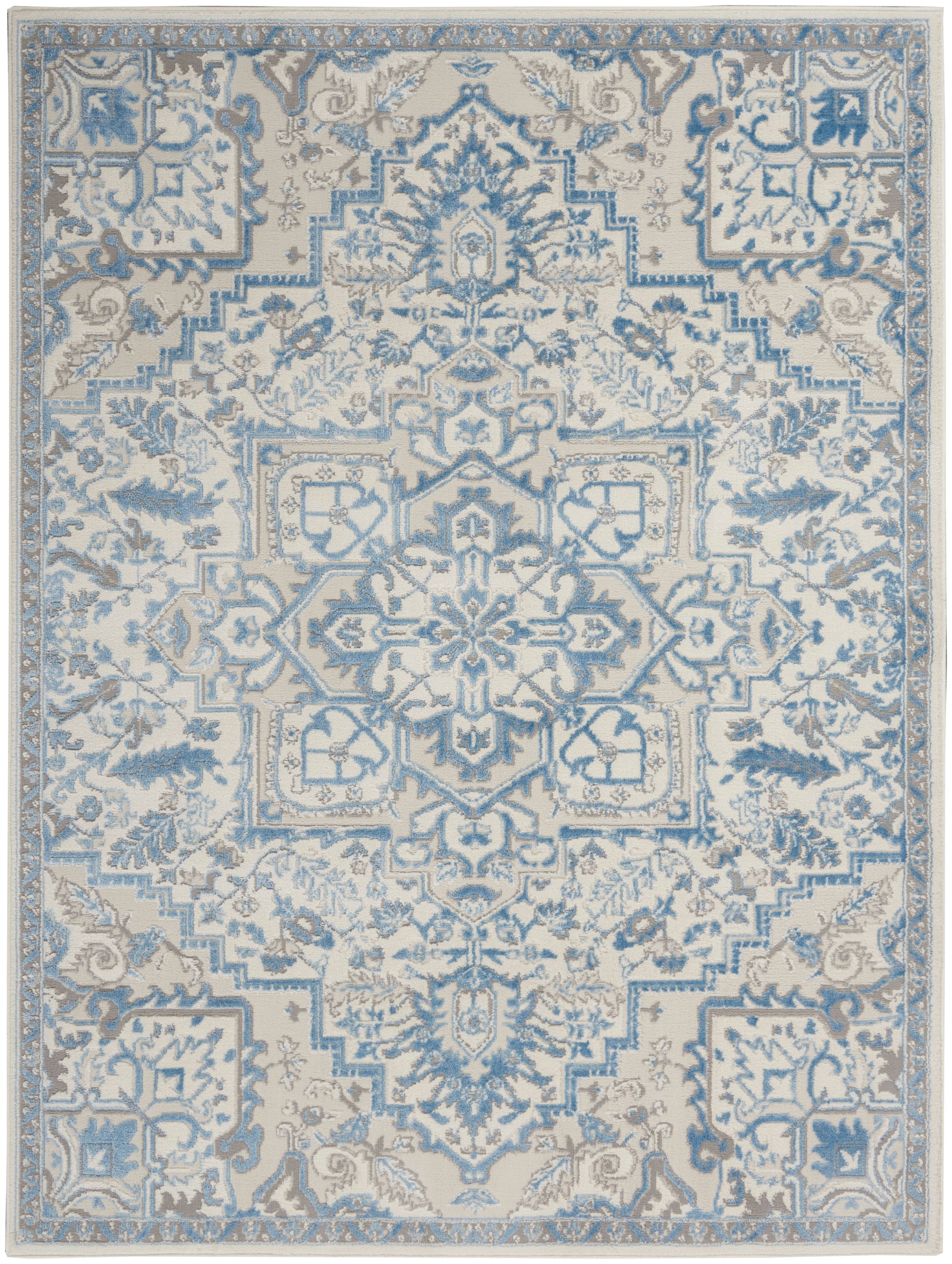 Blue & cream ornate area rug with central medallion and intricate floral border; traditional Persian-inspired design.