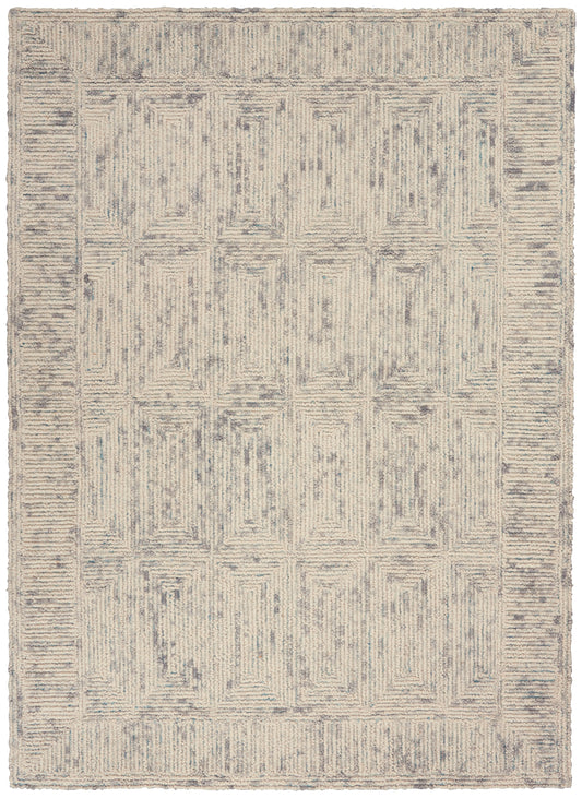 Beige and cream rug with blue-gray geometric pattern of stacked rectangles and border, soft textured pile.