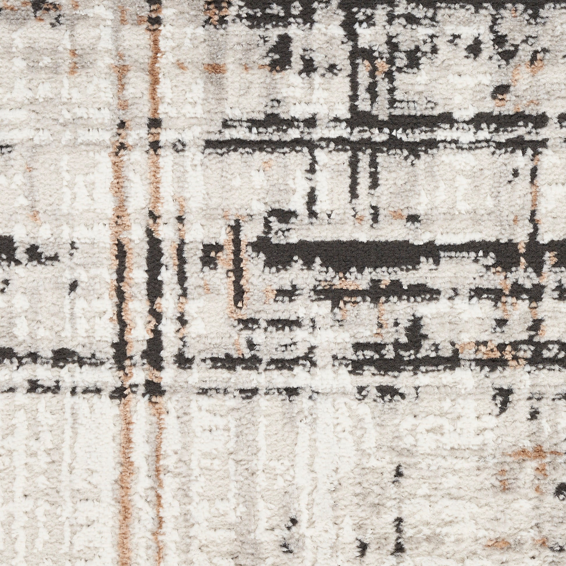 Cream shag rug close-up with black abstract geometric lines and subtle tan accents.