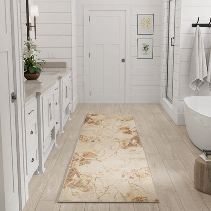 Beige marbled runner rug on light wood floor in white bathroom with vanity, framed art, glass shower, and freestanding tub.