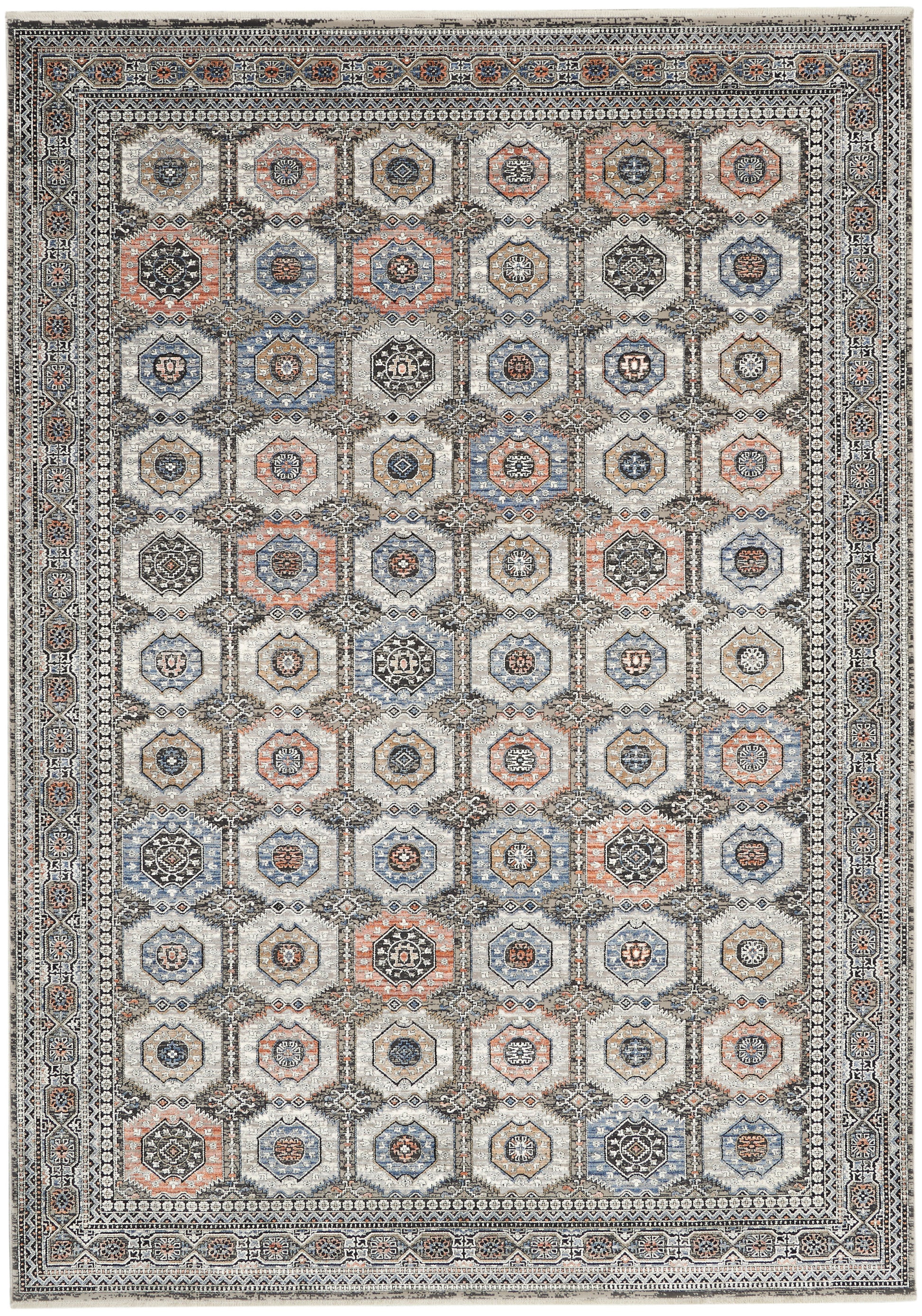 Rectangular Persian-style rug with repeating octagonal medallions in blue, coral, taupe and ivory; intricate floral borders.