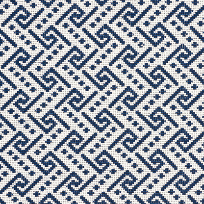 Navy blue and white woven fabric with an Ionic weave pattern.