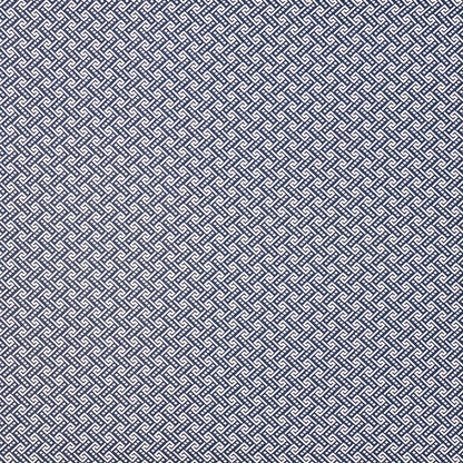 Navy blue and white interlocking geometric lattice pattern, dense woven fabric texture suitable for upholstery or apparel.