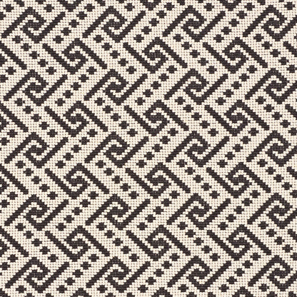 Beige woven fabric with a black interlocking Greek-key geometric pattern; versatile textile for upholstery or drapery.