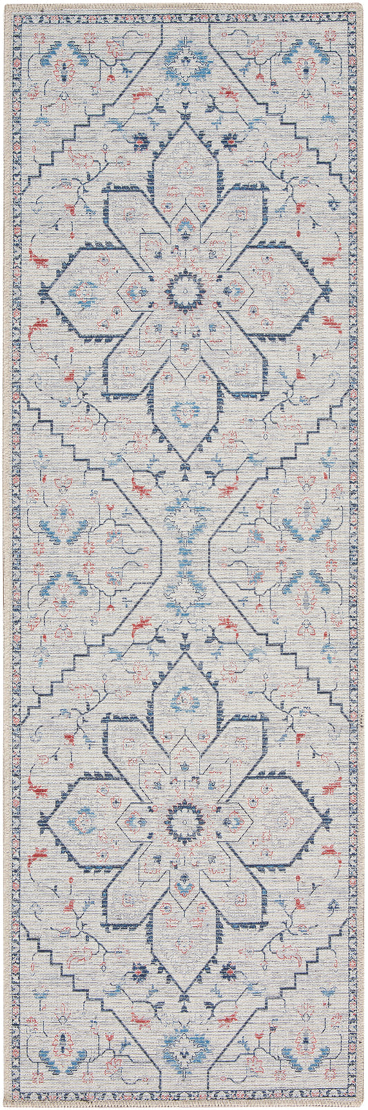 Ivory farmhouse-style runner rug with navy geometric medallions and blue and red floral accents, bordered trim.