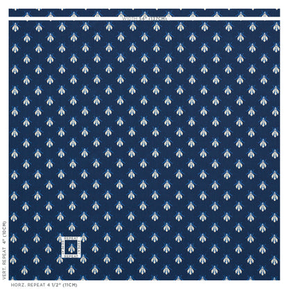 Navy blue velvet fabric with tiny white floral motifs in a repeating woven pattern; classic textile print.