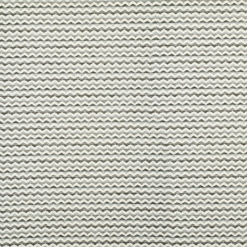 Close-up of gray and ivory chevron woven fabric with a soft, textured weave.
