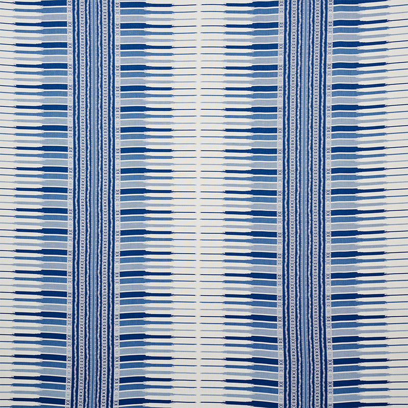 Blue and white striped fabric featuring vertical panels with intricate borders and repeating geometric motifs.