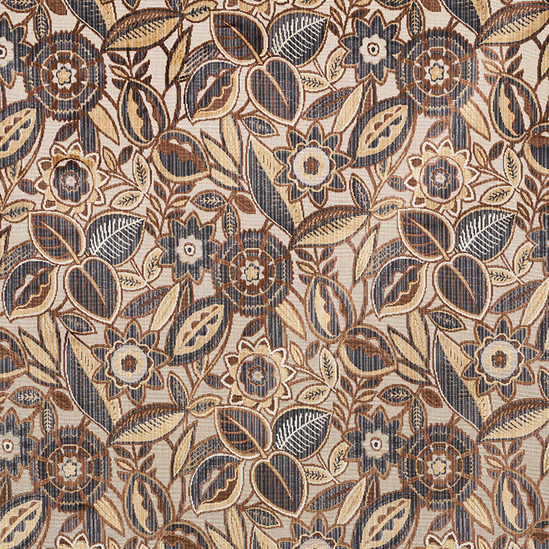 Beige, blue and brown floral woven upholstery fabric with vines and blossoms, textured tapestry style.