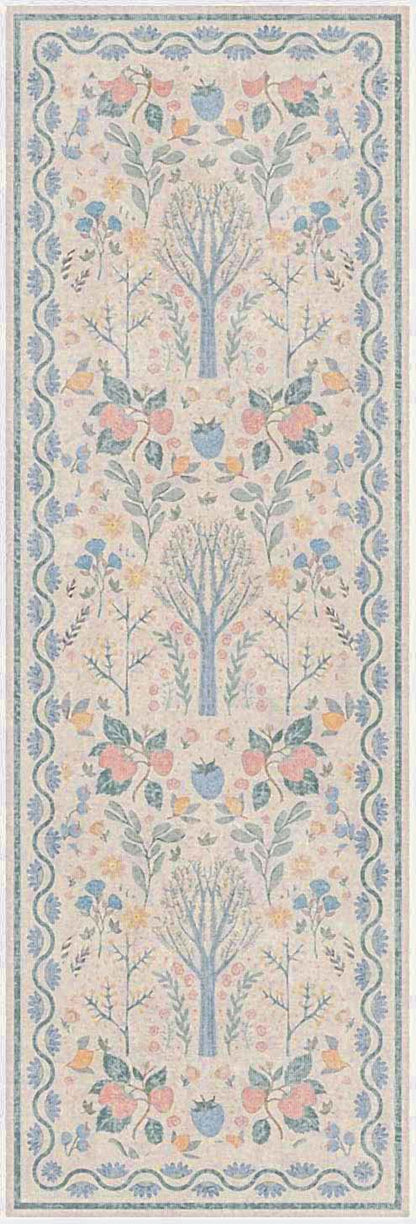 Pastel botanical tapestry runner: cream field, blue border, repeating trees & pink, blue, yellow flowers.