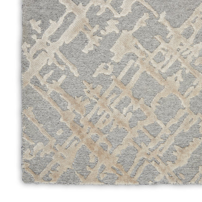 Gray-blue woven rug with beige cream abstract lattice pattern; textured modern area rug for living rooms.