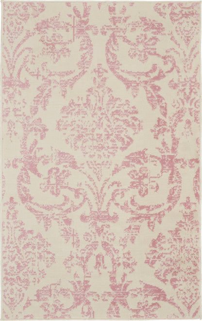 Cream rug with blush pink damask pattern and scrolling floral motifs, elegant vintage styling.
