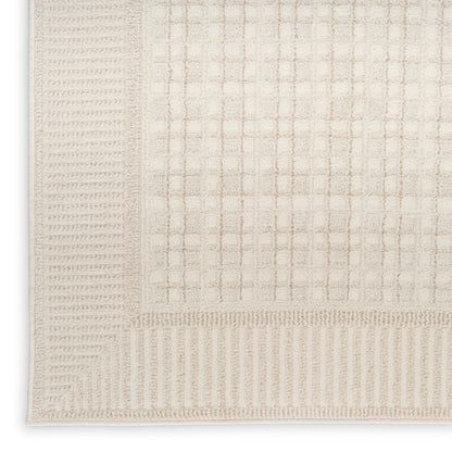 Beige rectangular rug with a soft woven grid pattern and ribbed border, neutral cream color for modern living spaces.
