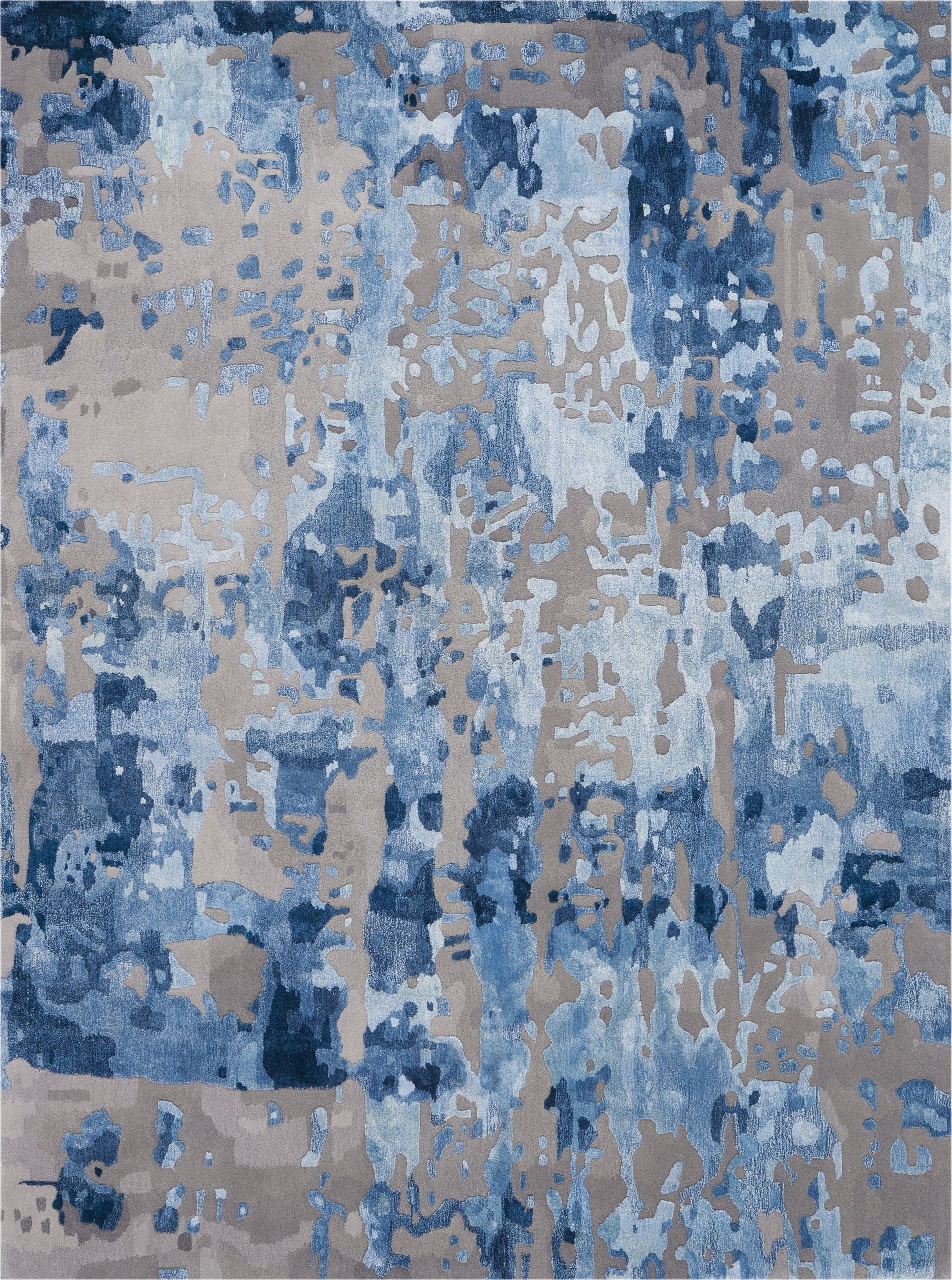 Abstract blue and beige area rug with irregular motif; modern contemporary decor for living room.