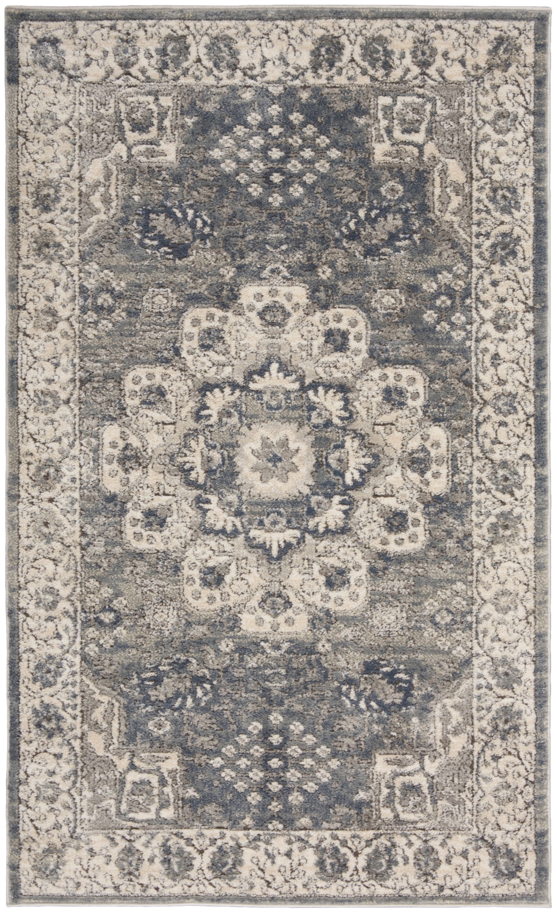 Blue-gray oriental rug with ivory border and central floral medallion; traditional Persian style, for living room.