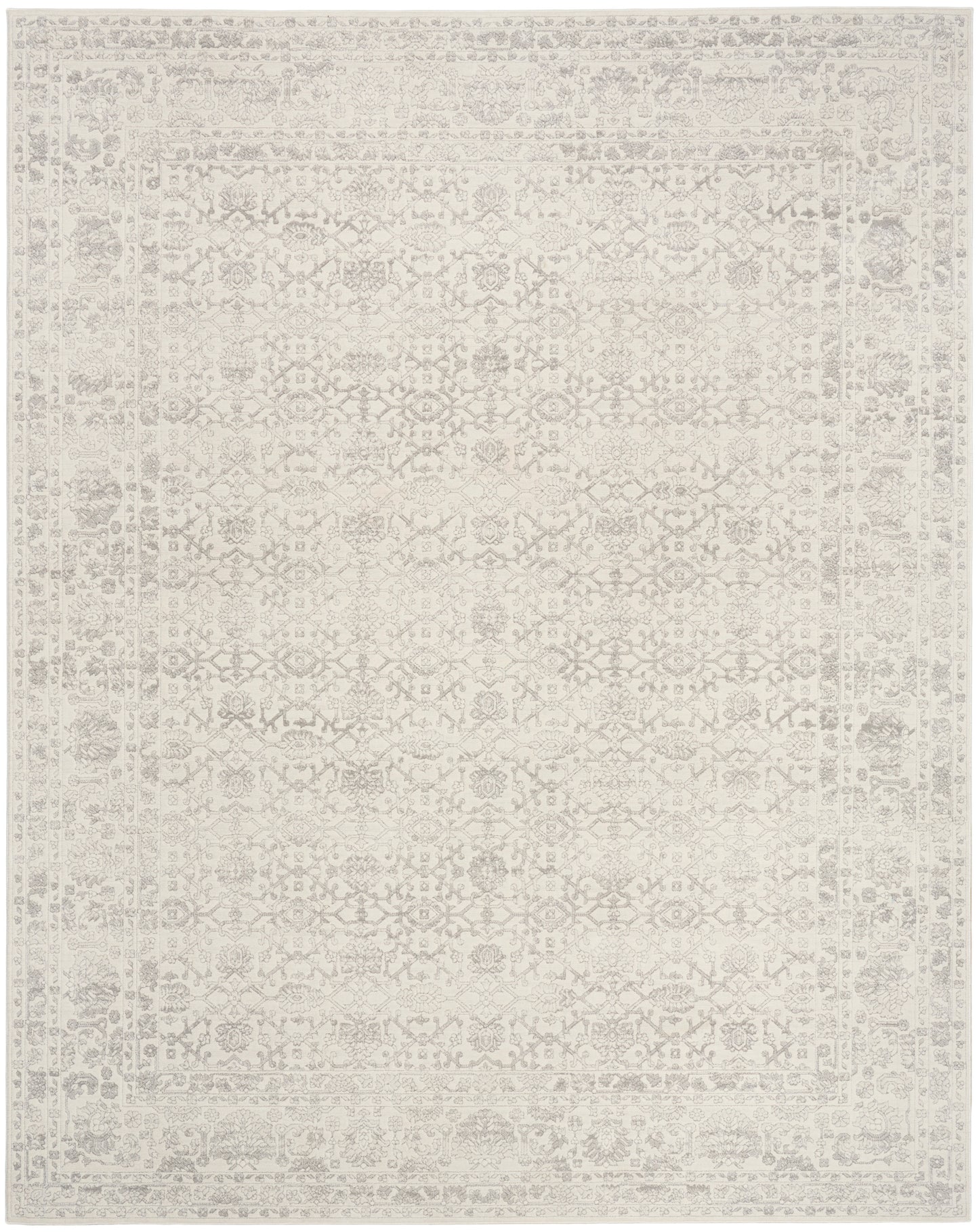 Rectangular cream rug with subtle vintage oriental pattern in soft neutral tones.