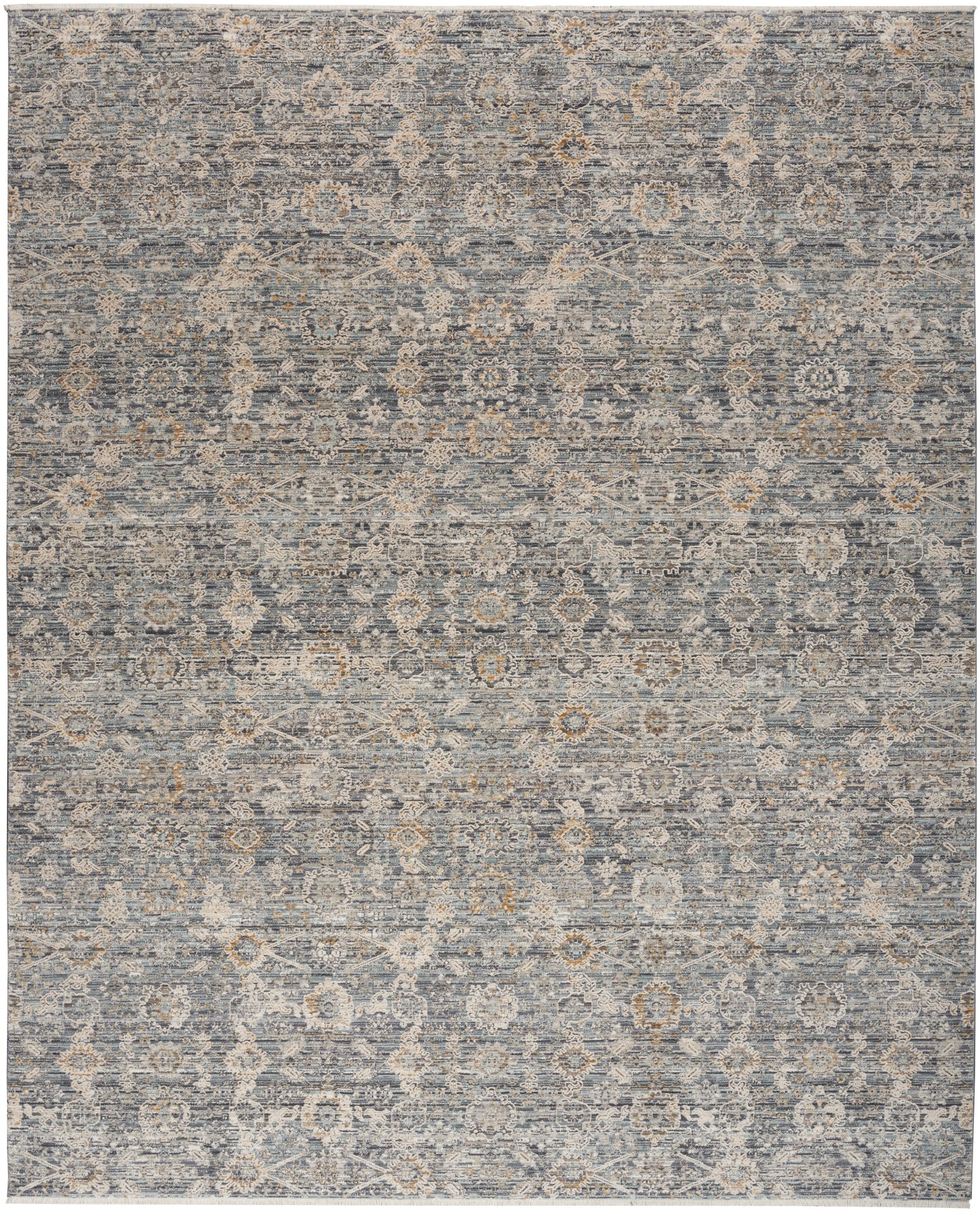 Blue-gray distressed-pattern rug with beige ivory medallion motifs; rectangular woven living-room rug.