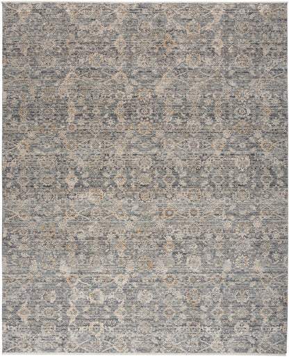 Blue-gray distressed-pattern rug with beige ivory medallion motifs; rectangular woven living-room rug.