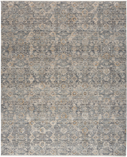 Blue-gray distressed-pattern rug with beige ivory medallion motifs; rectangular woven living-room rug.