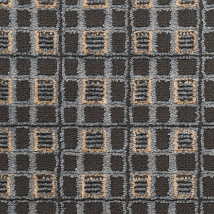 Dark charcoal rug with a gray grid pattern and beige outlined squares in a geometric repeating motif.