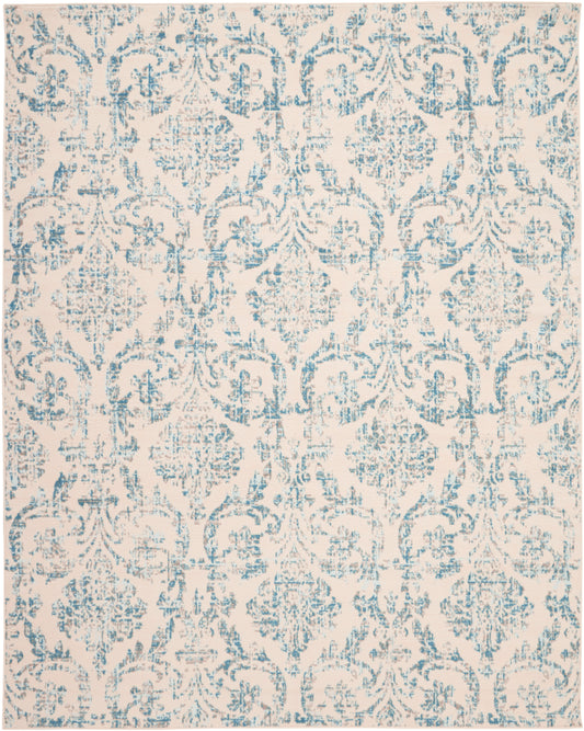 Rectangular beige rug with turquoise damask pattern; ornate vintage-style area rug.