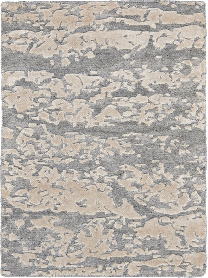 Abstract gray and beige area rug with irregular camo-like pattern; plush woven texture for modern living spaces.