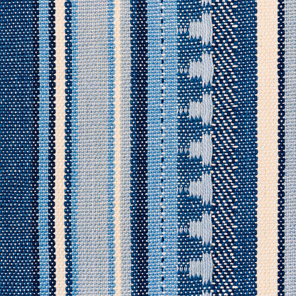 Blue striped woven fabric with navy, sky blue and cream stripes; textured dotted and leaf-like pattern for upholstery.
