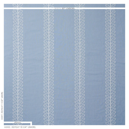 Blue rug with repeating vertical white vine leaf motifs; modern decorative area rug.