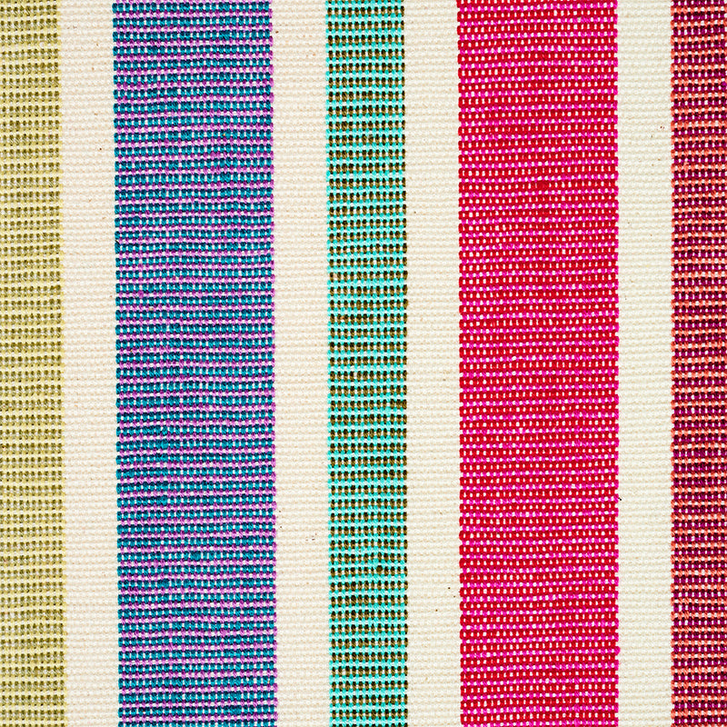 Woven textile with cream base and vertical stripes in gold, blue, teal, pink, magenta and brown; versatile decorative throw.