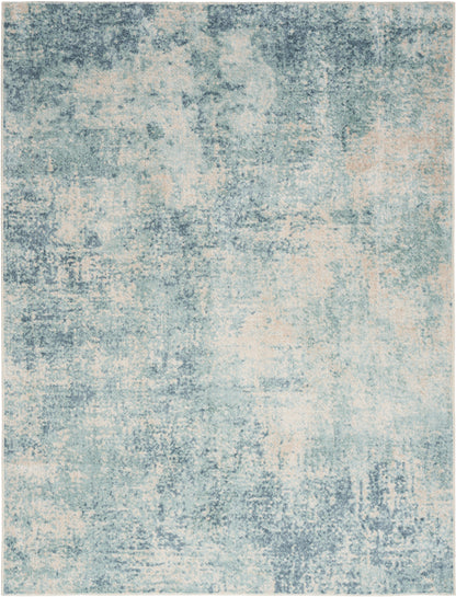 Rectangular blue & cream distressed abstract area rug with soft texture for vintage-modern decor.