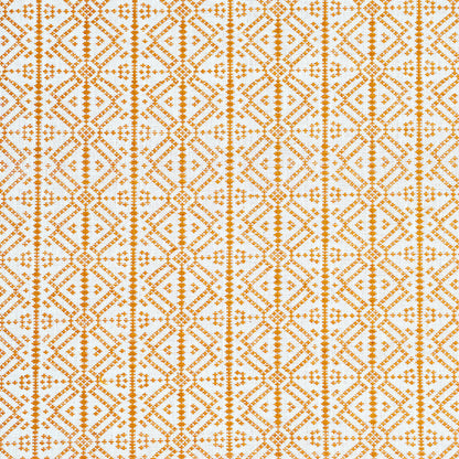 Orange geometric lattice textile pattern with diamonds and triangles on a white background; decorative fabric in warm tones.