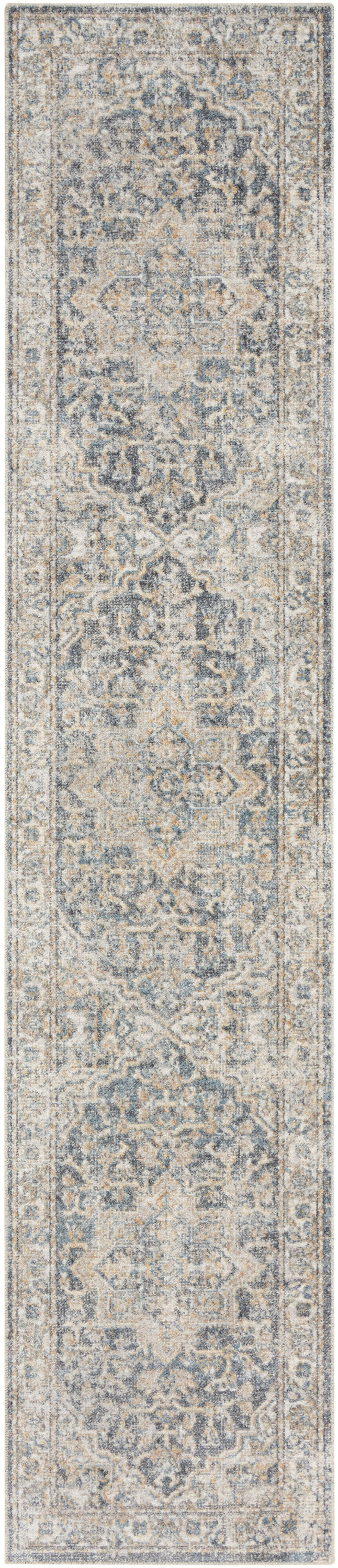 Long rectangular runner rug with distressed blue-gray and ivory Persian-inspired medallion pattern, hallway use.