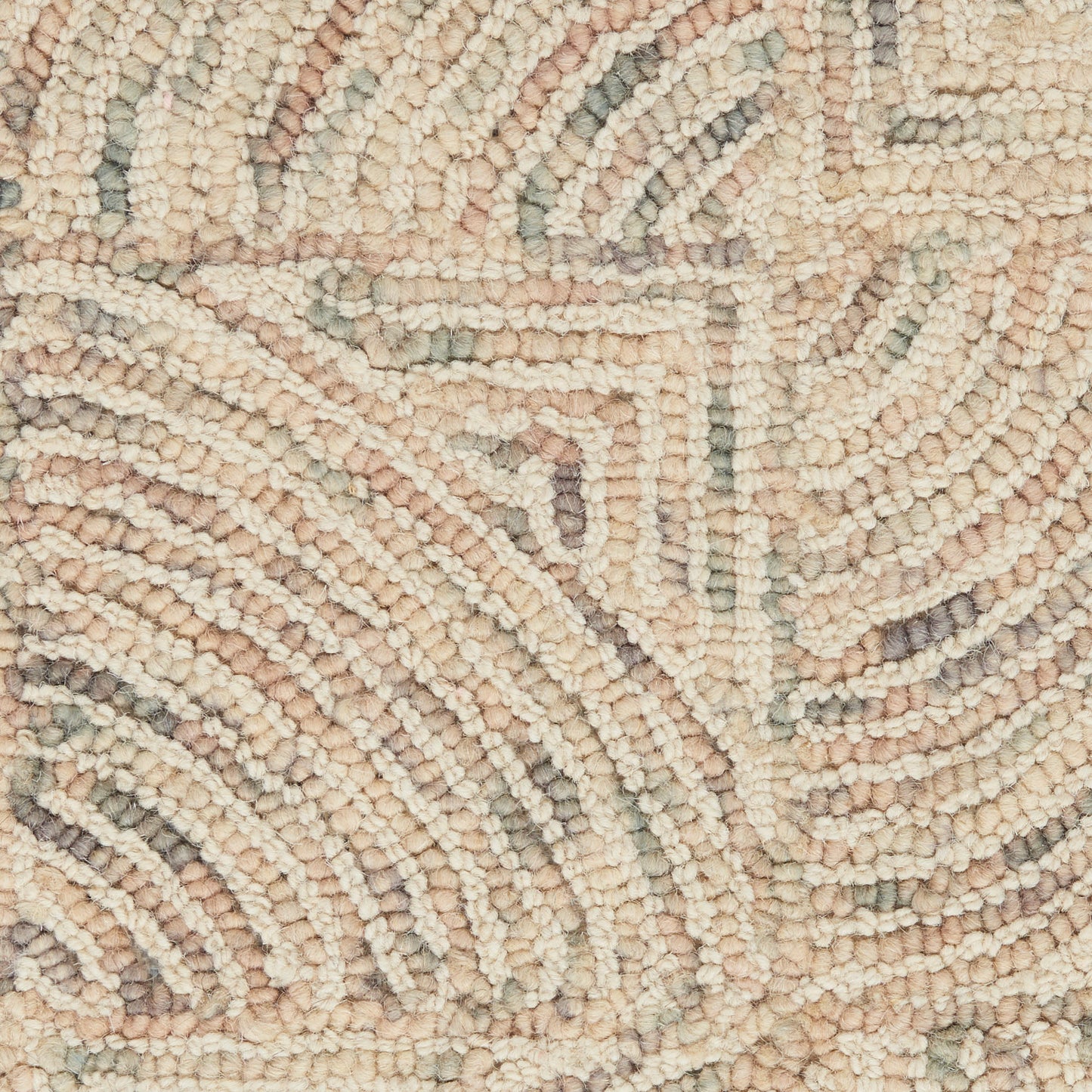 Cream-beige tufted rug with soft pink and gray geometric swirls; plush loop pile for cozy contemporary spaces.